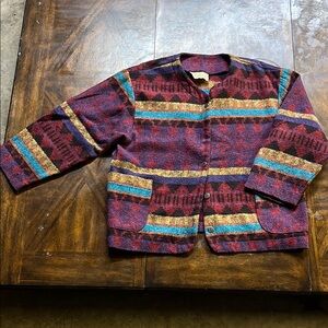 ‘Bonjour’ Colorful Patterned Jacket with silver accented buttons.